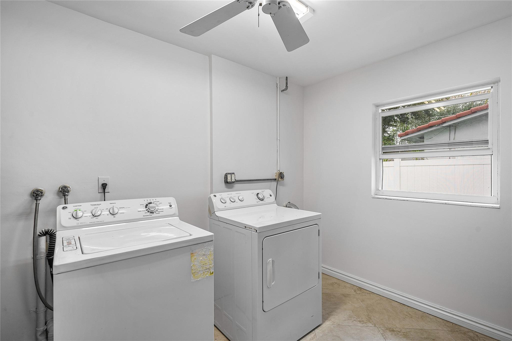 290 Northeast 29th Street Boca Raton, FL 33431 - Photo 28 of 48 a utility room with dryer and washer