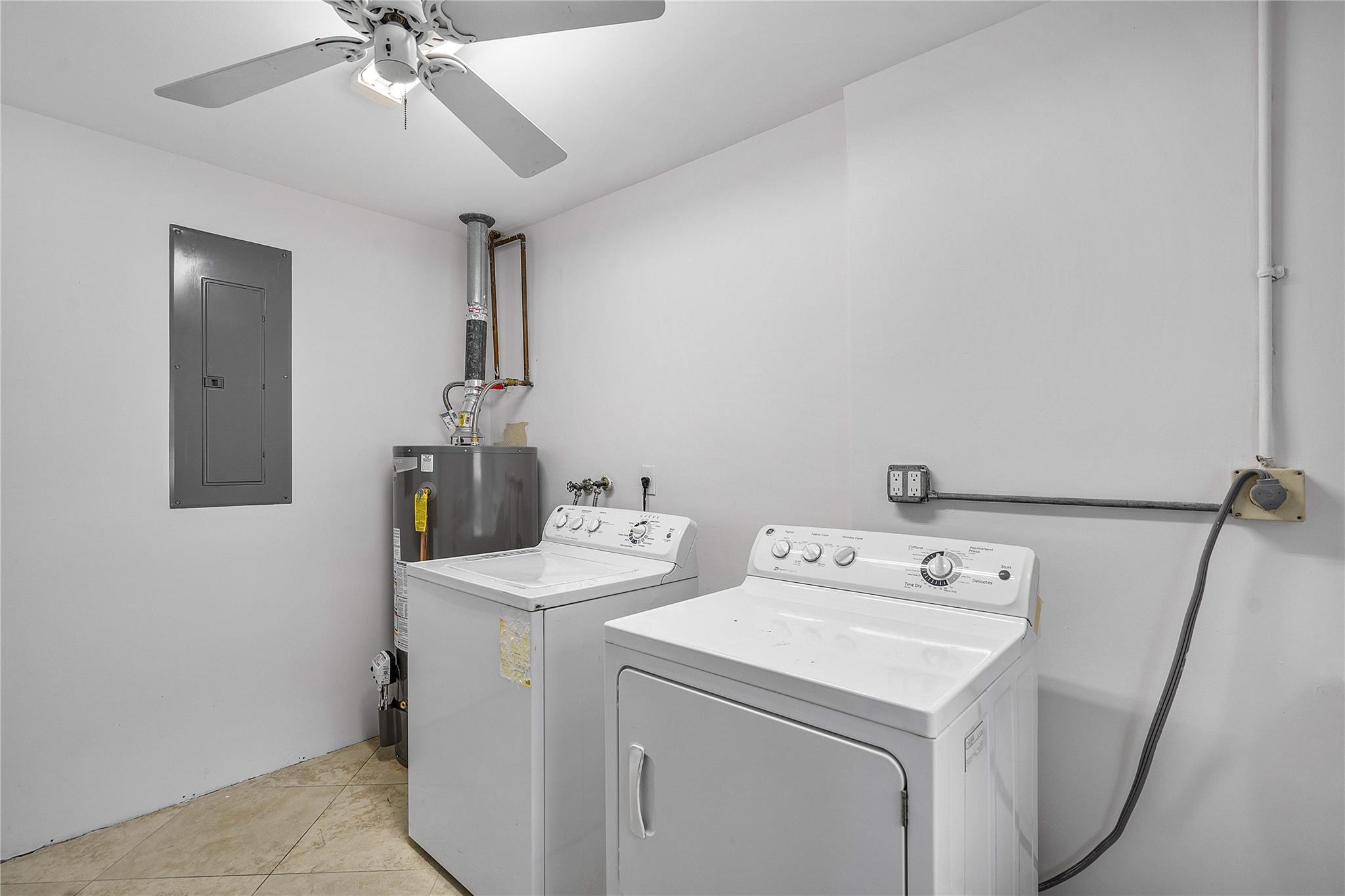 290 Northeast 29th Street Boca Raton, FL 33431 - Photo 29 of 48 a utility room with dryer and washer