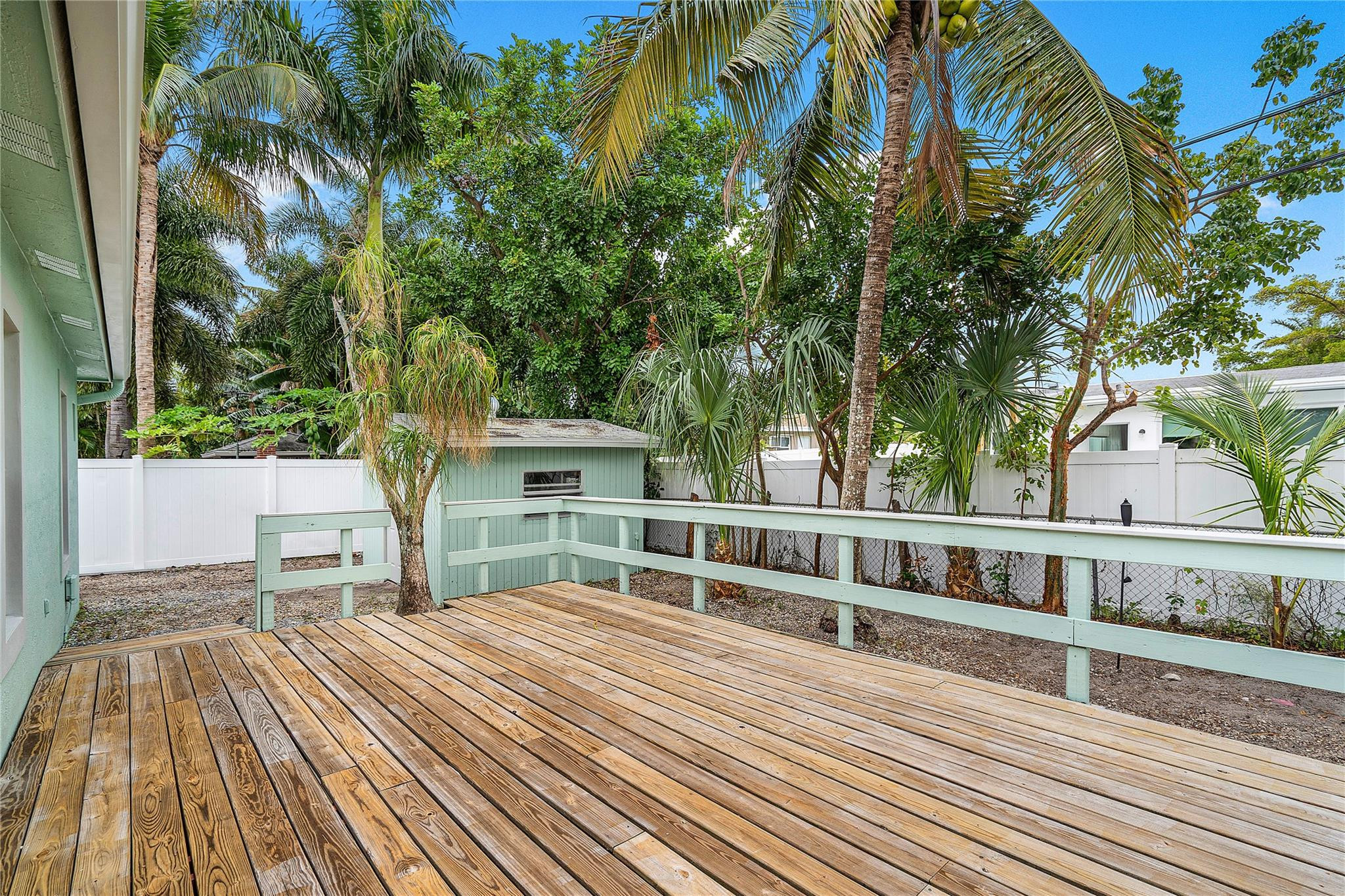 290 Northeast 29th Street Boca Raton, FL 33431 - Photo 32 of 48 a view of a house with a deck