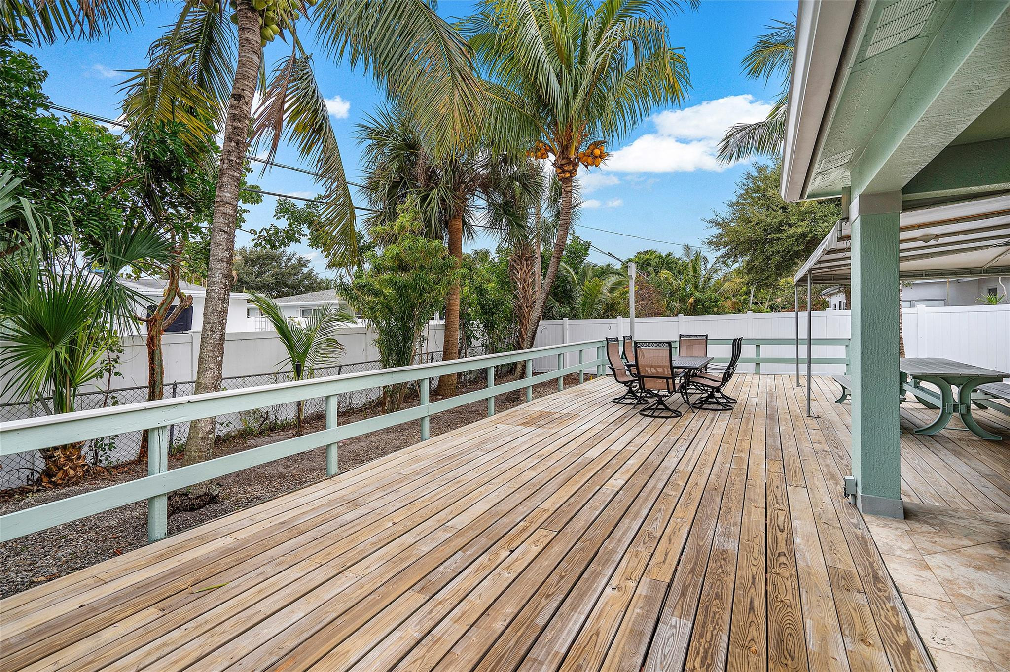 290 Northeast 29th Street Boca Raton, FL 33431 - Photo 34 of 48 a view of balcony with furniture and wooden floor