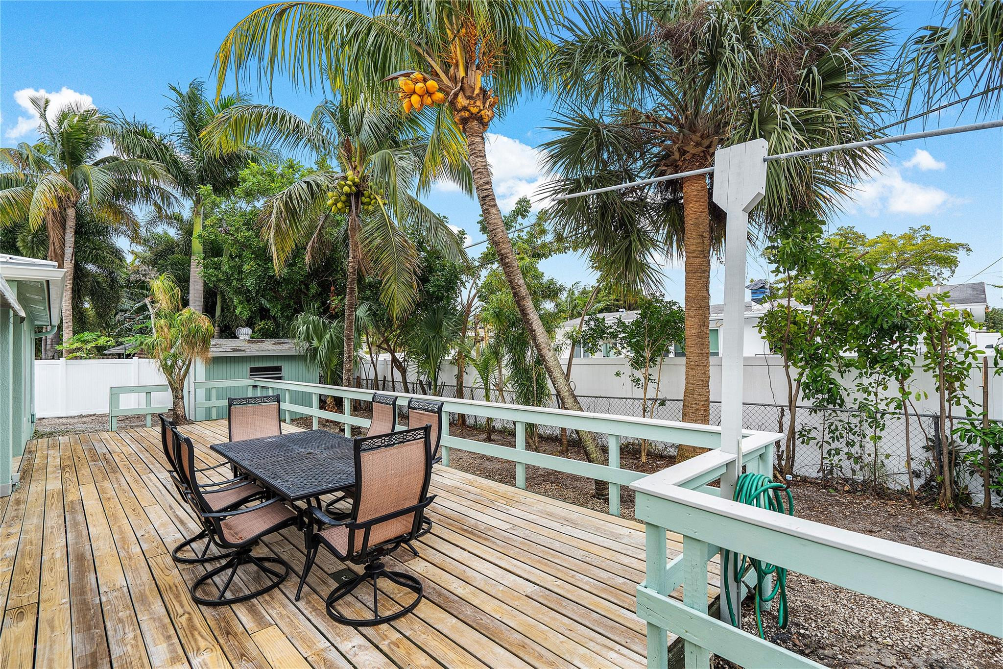 290 Northeast 29th Street Boca Raton, FL 33431 - Photo 36 of 48 a view of a chairs and table on the deck