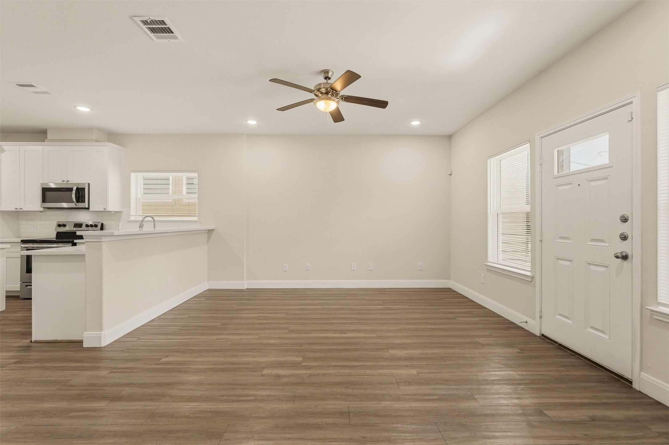 2218 Bringhurst Street, Unit B Houston, TX 77026 - Photo 6 of 25 a view of a kitchen with a sink and dishwasher