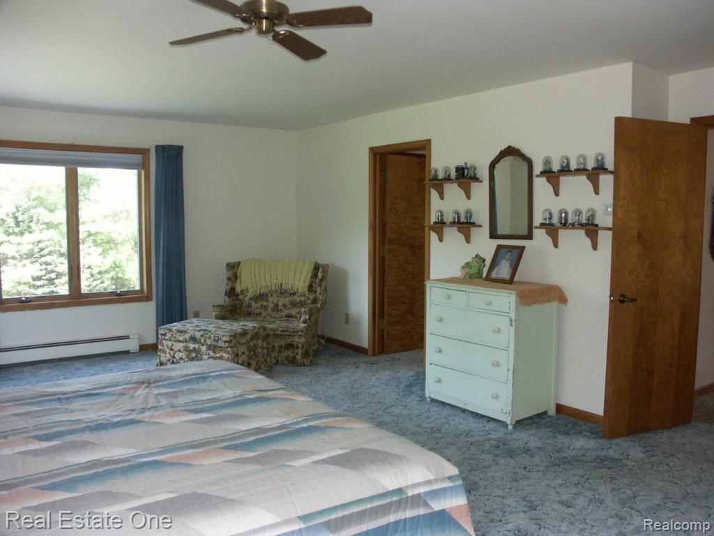1470 Ranch Road Holly, MI 48442 - Photo 41 of 63 Master bedroom w/walk in closet & 2nd closet