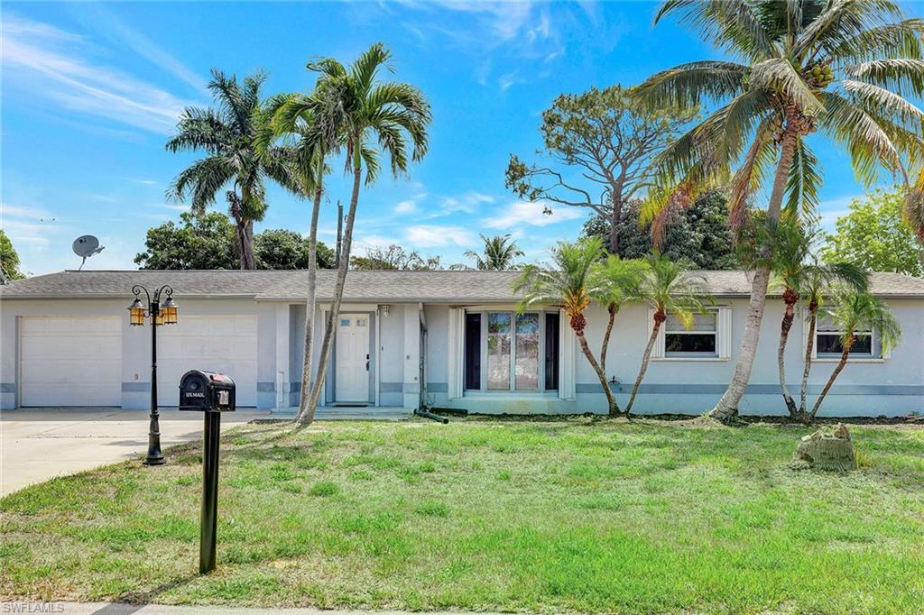 a front view of house with yard