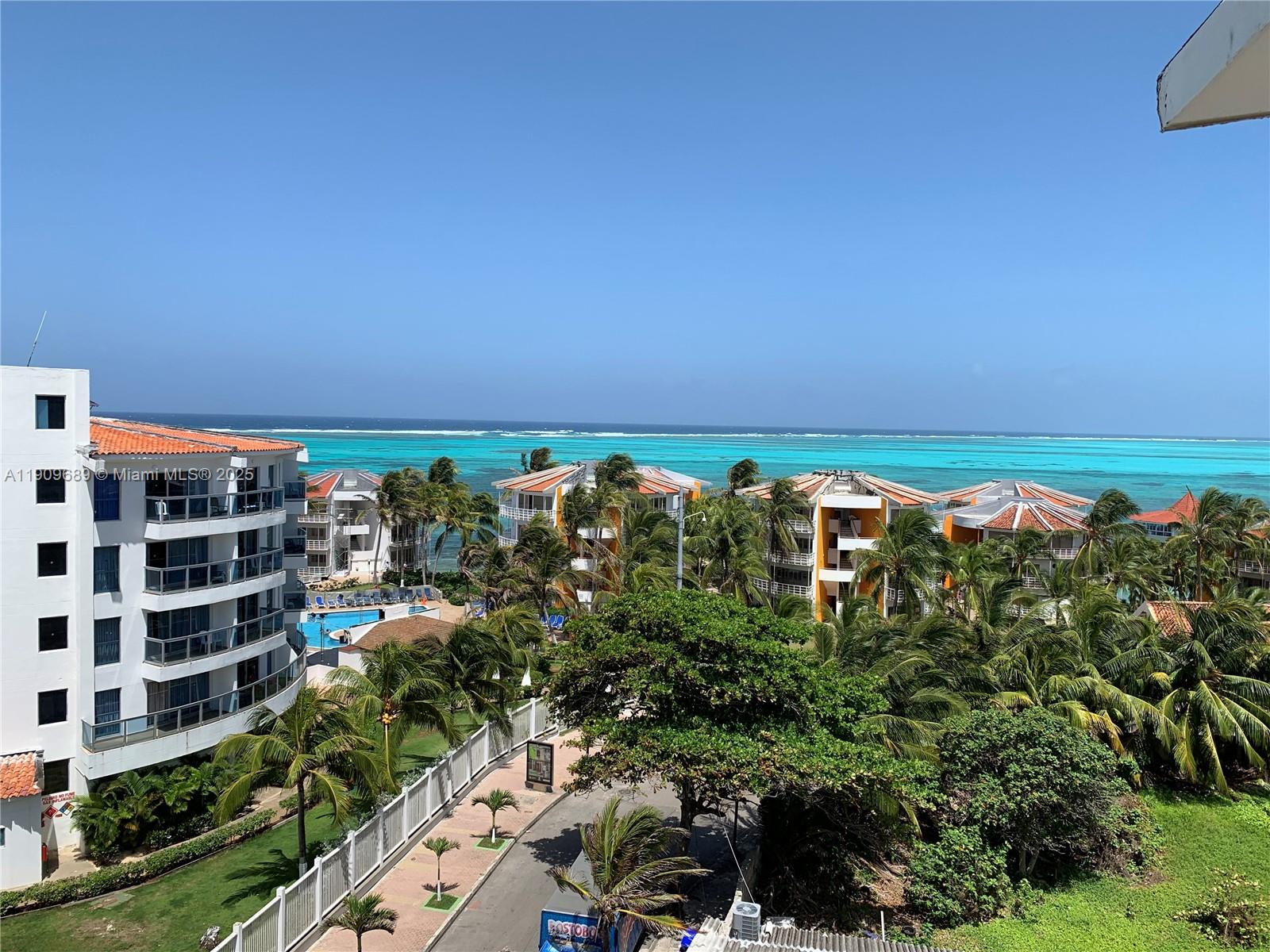 Las Cruces Las Cruces, SA 88001 - Photo 12 of 22 a view of building with yard and mountain view in back