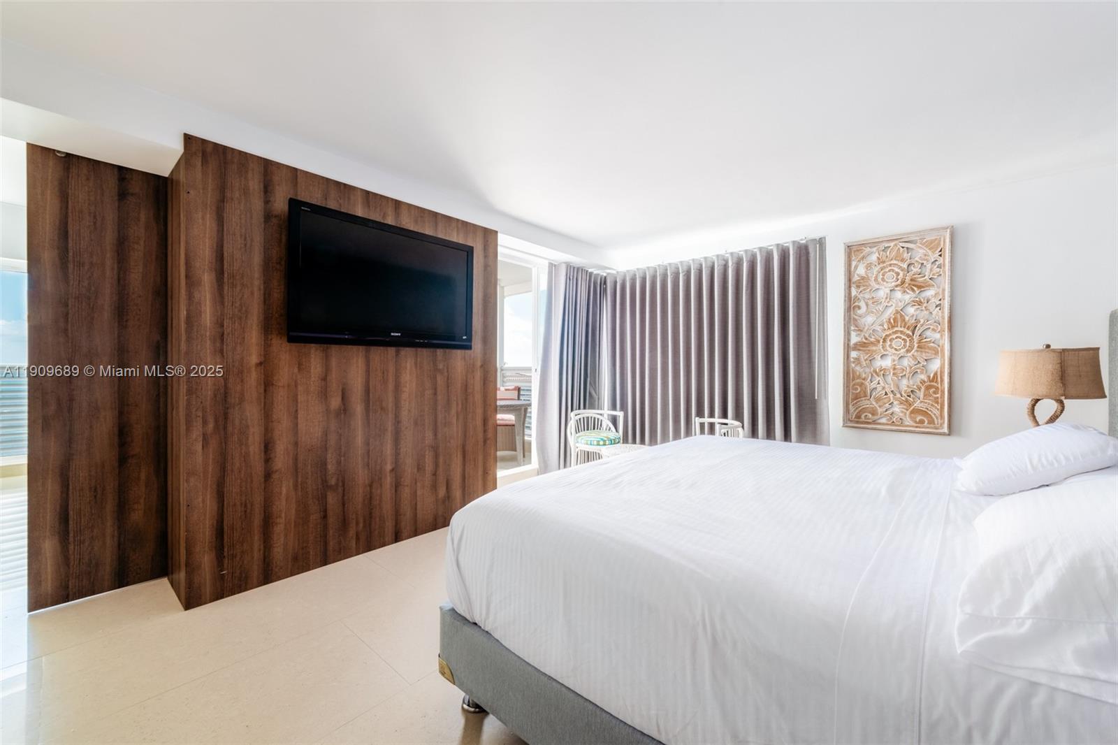 Las Cruces Las Cruces, SA 88001 - Photo 20 of 22 a bedroom with a bed and a flat screen tv