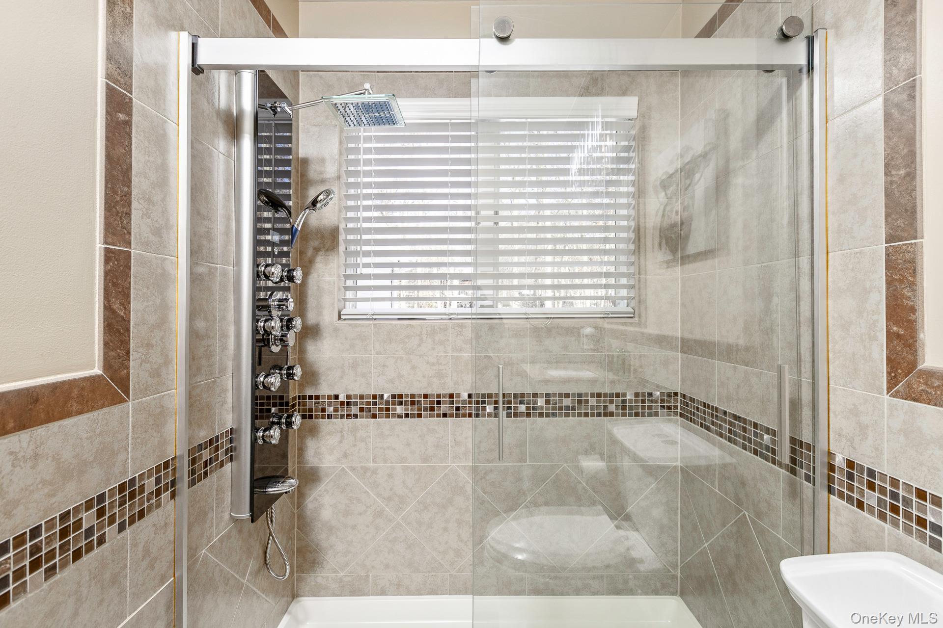 503 Wading River Road Manorville, NY 11949 - Photo 21 of 45 Full bathroom featuring a stall shower