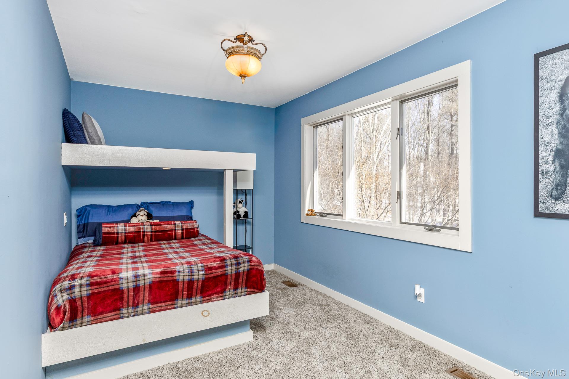 503 Wading River Road Manorville, NY 11949 - Photo 24 of 45 Carpeted bedroom with baseboards