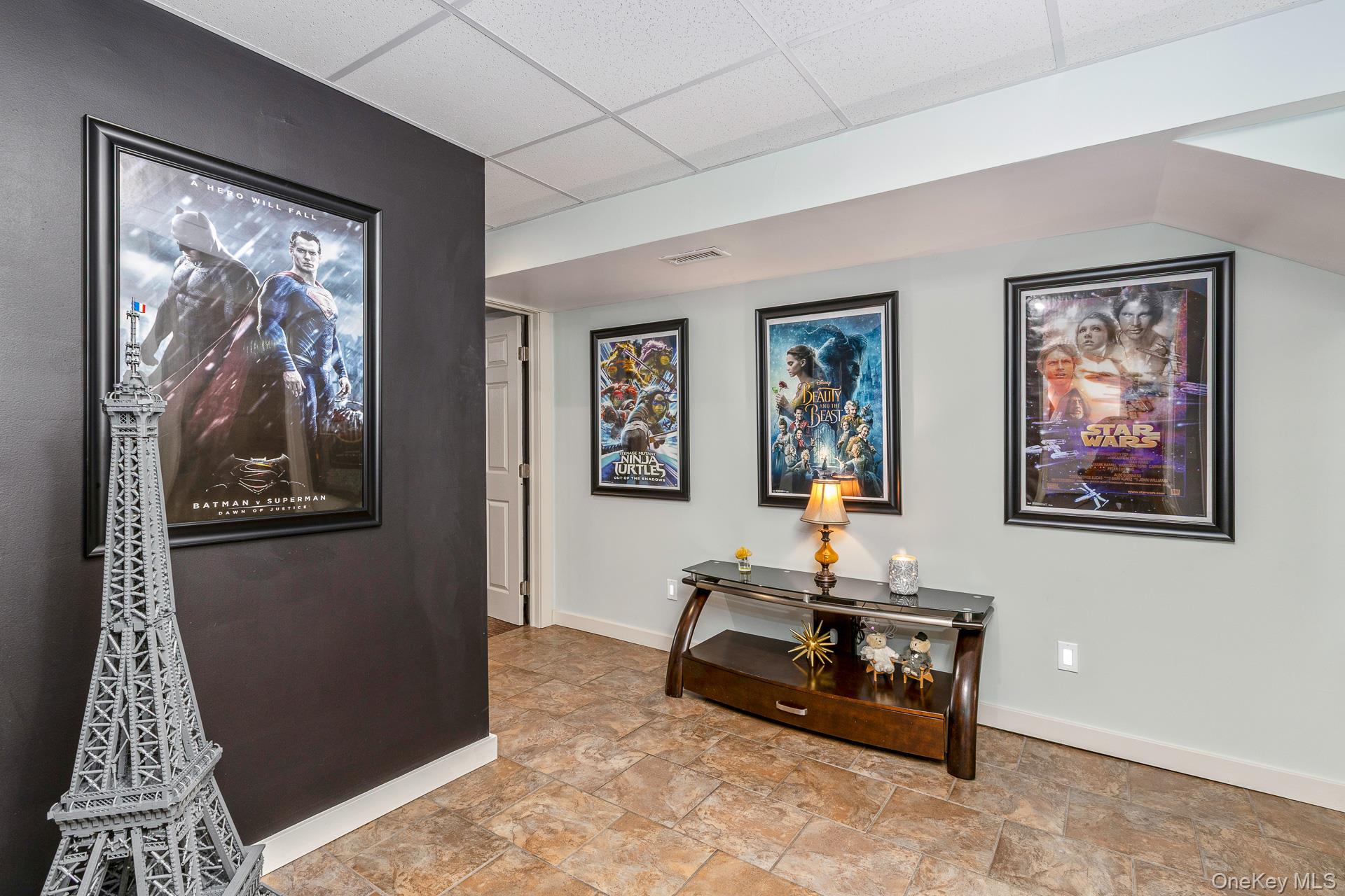 503 Wading River Road Manorville, NY 11949 - Photo 29 of 45 Hall with stone finish floors and a paneled ceiling