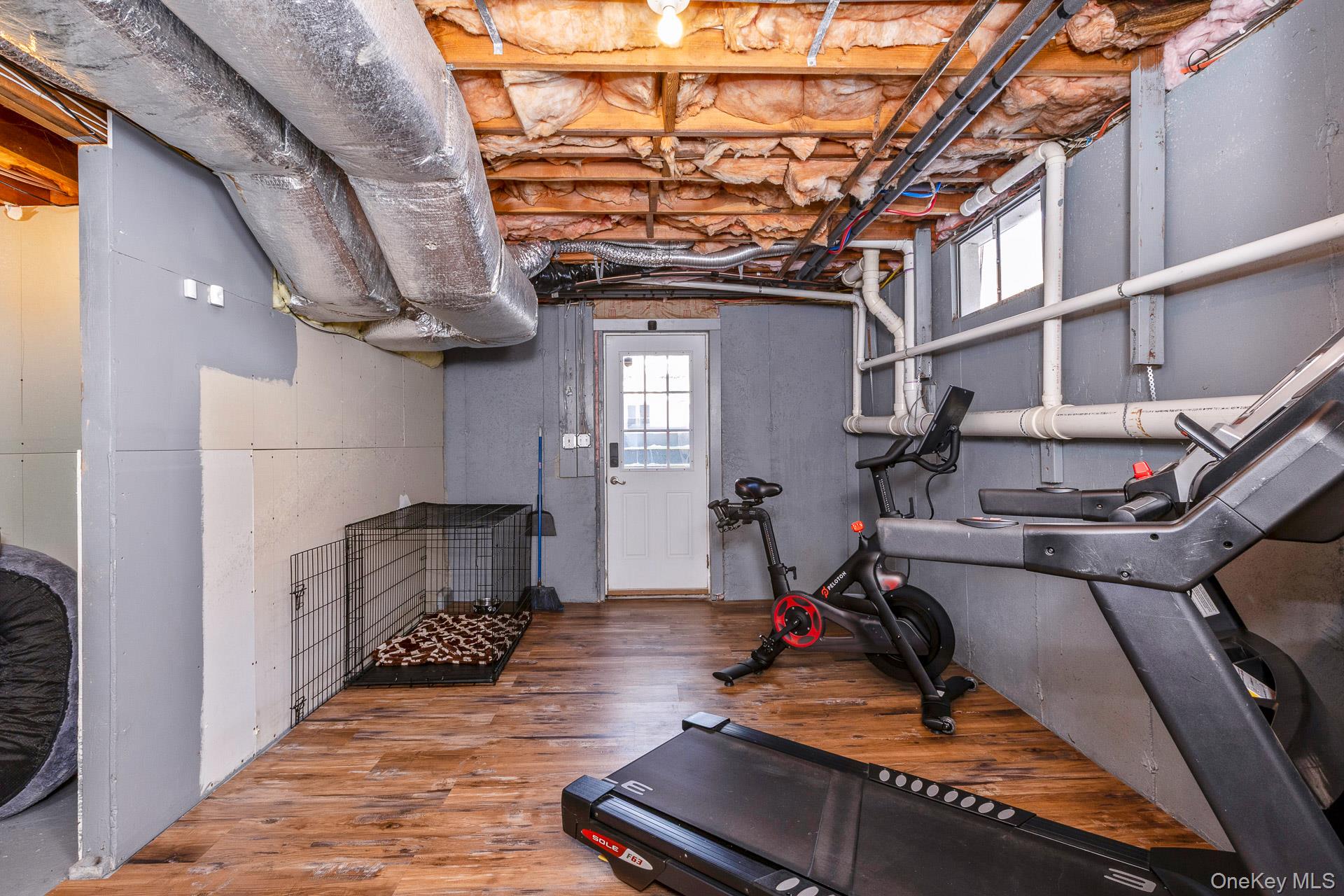 503 Wading River Road Manorville, NY 11949 - Photo 37 of 45 Exercise area with wood finished floors