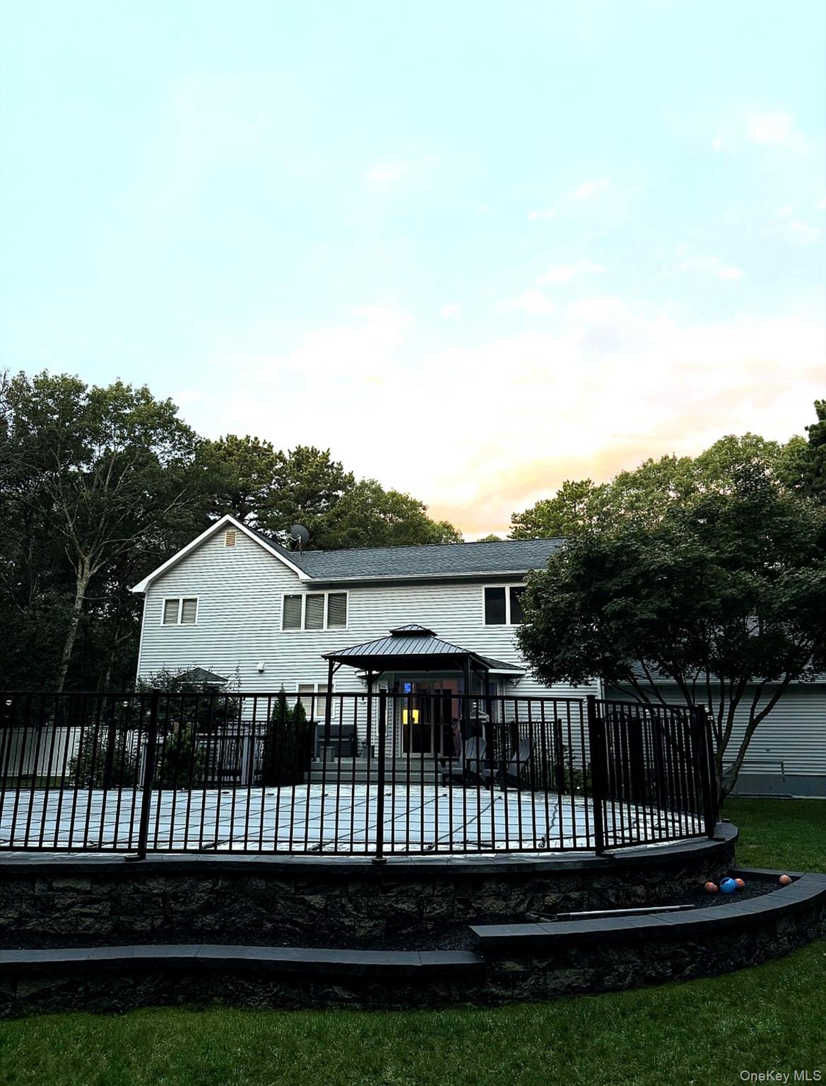 503 Wading River Road Manorville, NY 11949 - Photo 39 of 45 Rear view of house featuring a gazebo and a deck