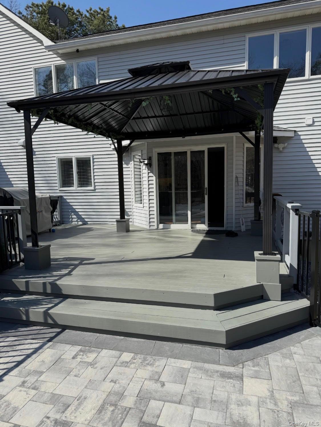 503 Wading River Road Manorville, NY 11949 - Photo 44 of 45 Rear view of property with a gazebo and a deck