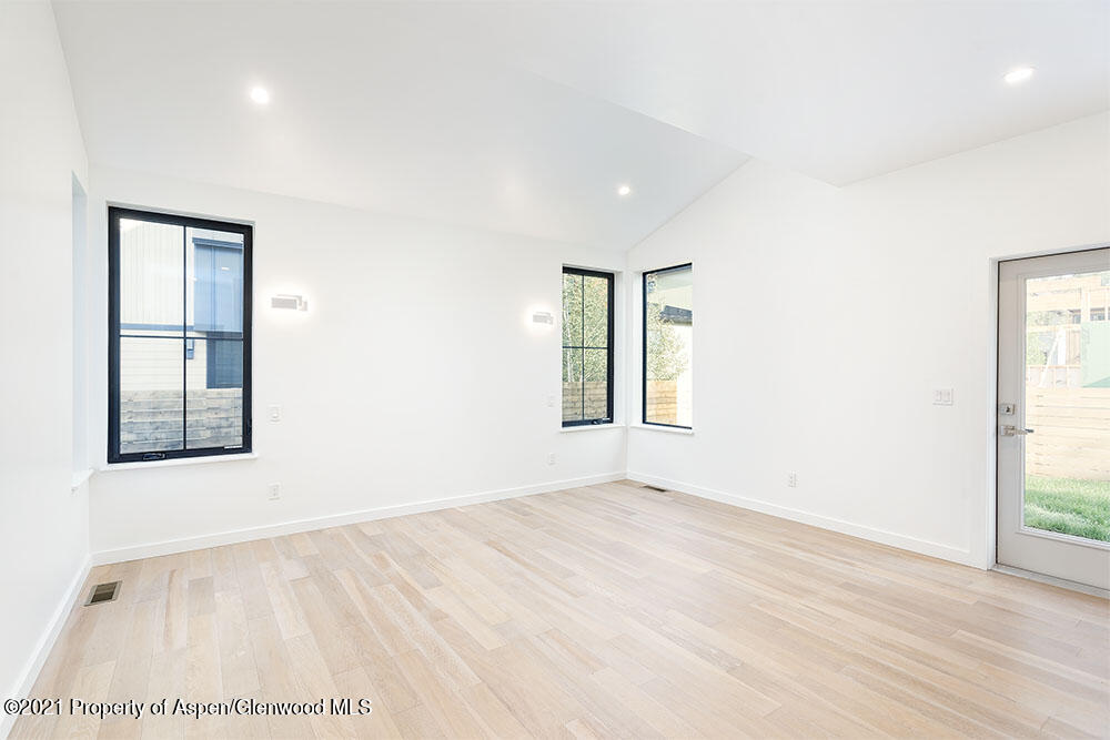 132 Valley Court Basalt, CO 81621 - Photo 16 of 38 an empty room with windows and closet
