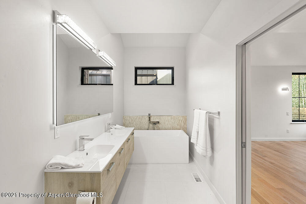 132 Valley Court Basalt, CO 81621 - Photo 17 of 38 a bathroom with a sink and a mirror