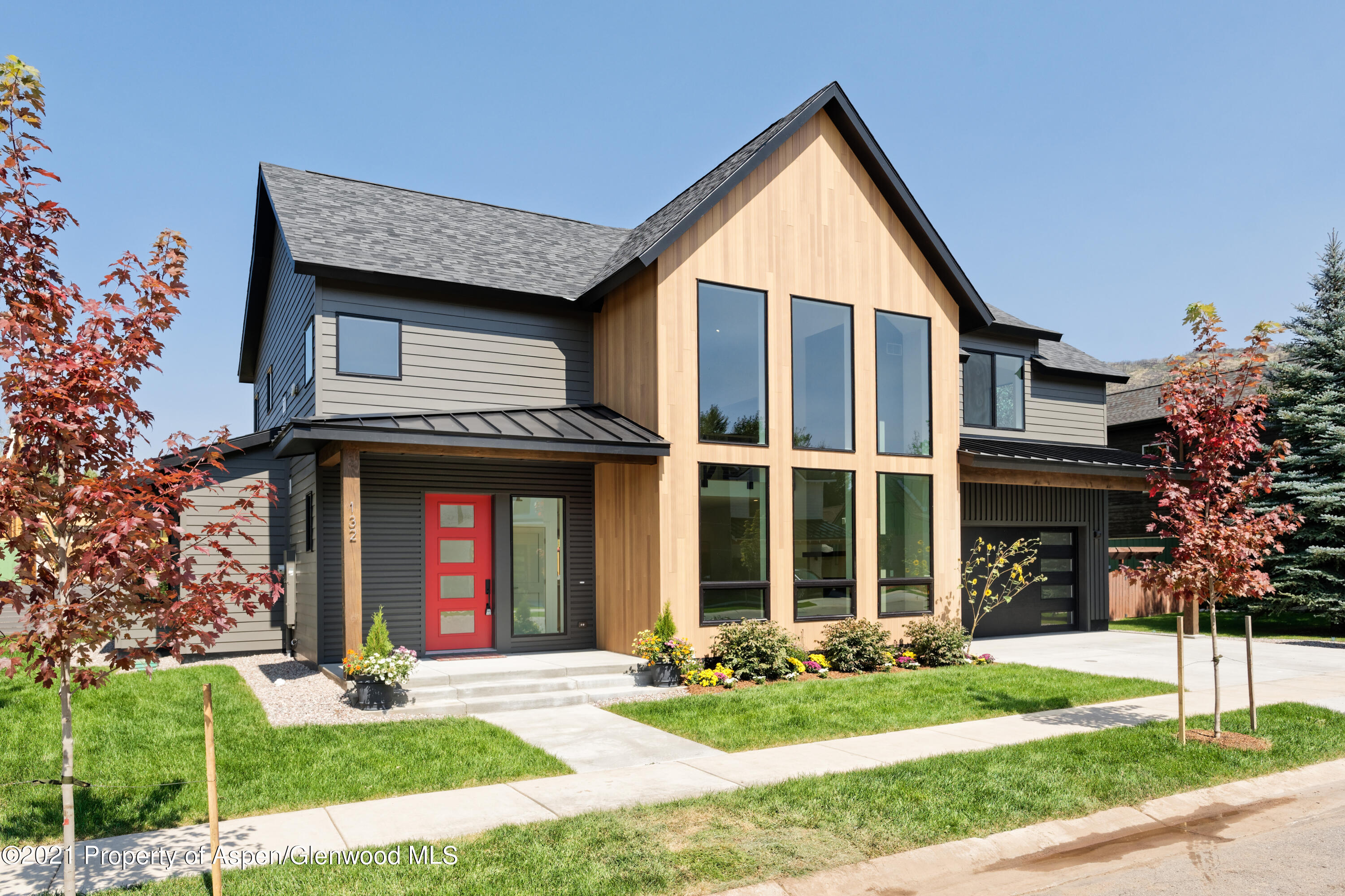 132 Valley Court Basalt, CO 81621 - Photo 2 of 38 a front view of a house with garden