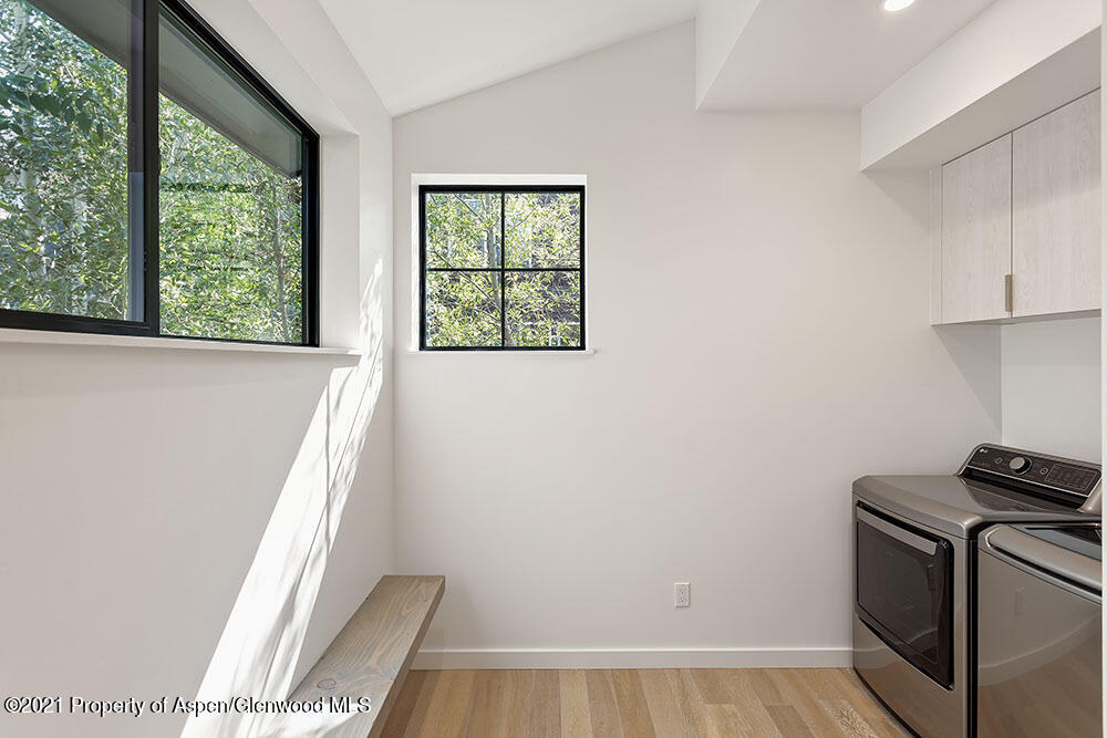 132 Valley Court Basalt, CO 81621 - Photo 32 of 38 a view of a kitchen with wooden floor and electronic appliances