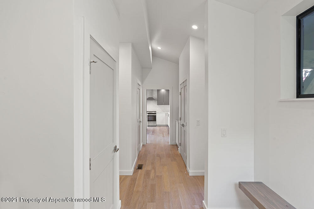 132 Valley Court Basalt, CO 81621 - Photo 34 of 38 a view of hallway with wooden floor