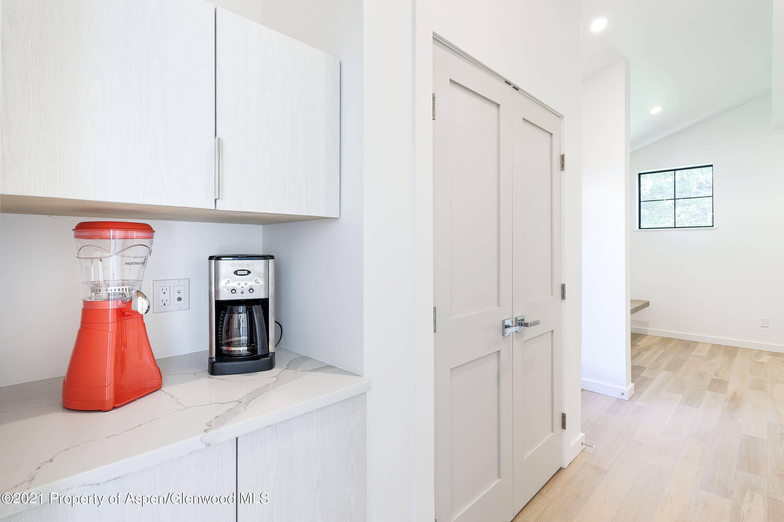 132 Valley Court Basalt, CO 81621 - Photo 35 of 38 a view of a room with wooden floor and cabinet