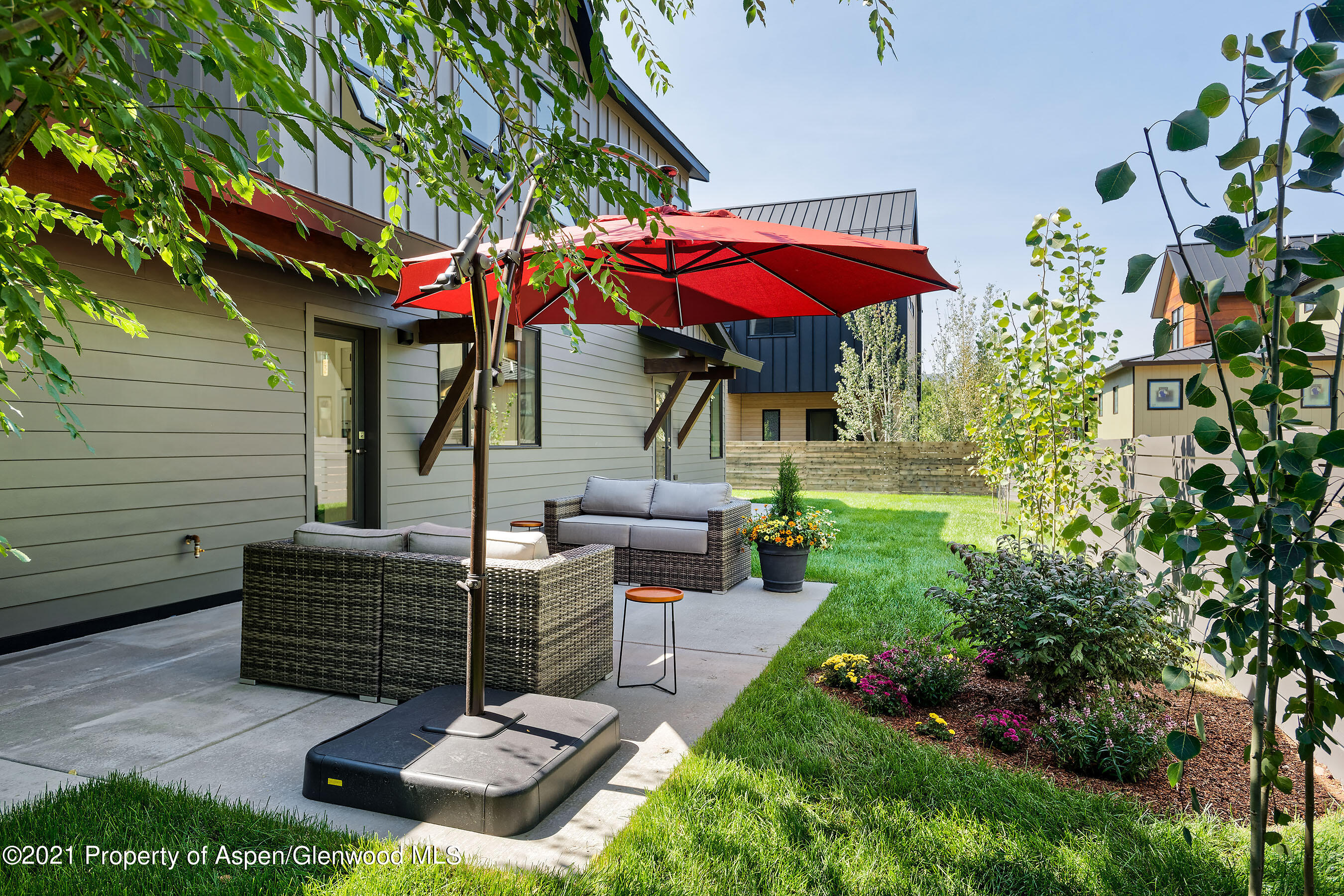 132 Valley Court Basalt, CO 81621 - Photo 5 of 38 a view of a chairs and table in the backyard
