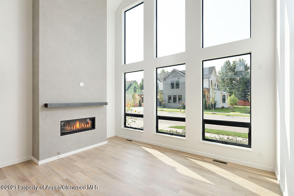 132 Valley Court Basalt, CO 81621 - Photo 10 of 38 an empty room with entrance and window