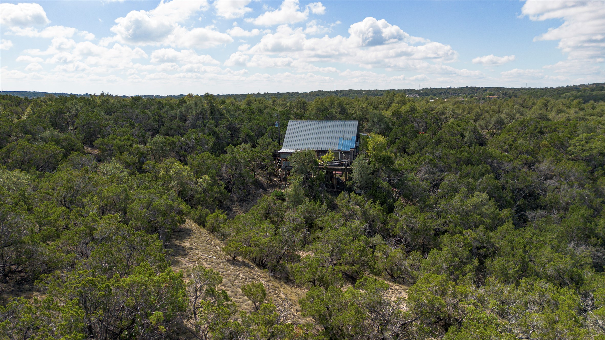 1970 Martin Road Dripping Springs, TX 78620 - Photo 1 of 40 CABIN TUCKED AWAY IN THE HILL COUNTRY