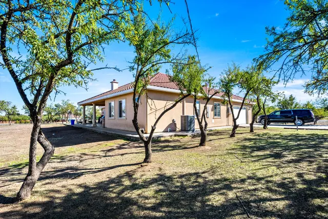 a view of swimming pool with a yard