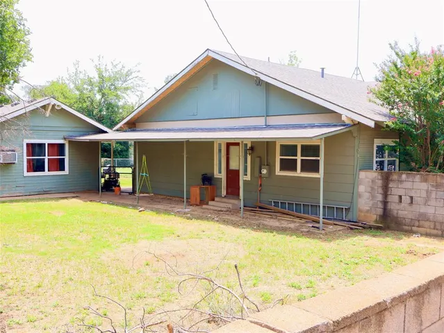 a view of a house with a swimming pool