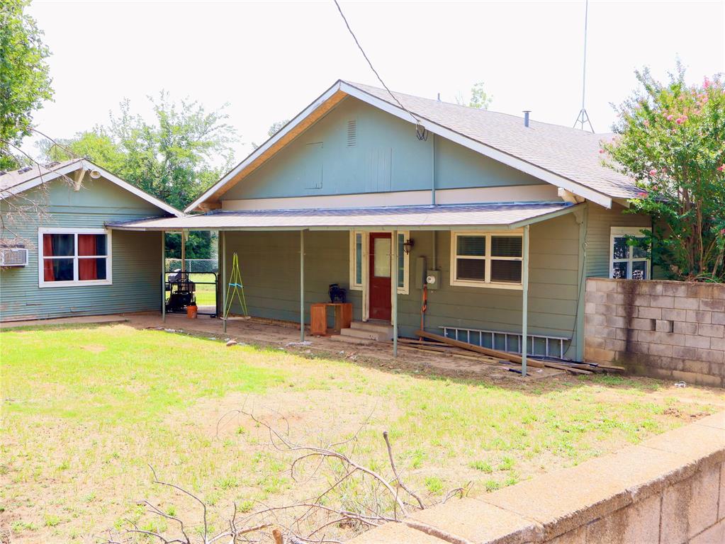 203 Bennett Street Strawn, TX 76475 - Photo 25 of 28 a view of a house with a swimming pool