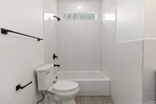 a view of small space with wooden floor