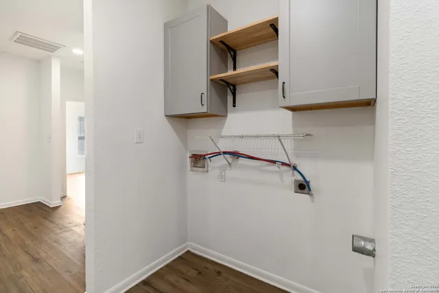 a view of house with a backyard space