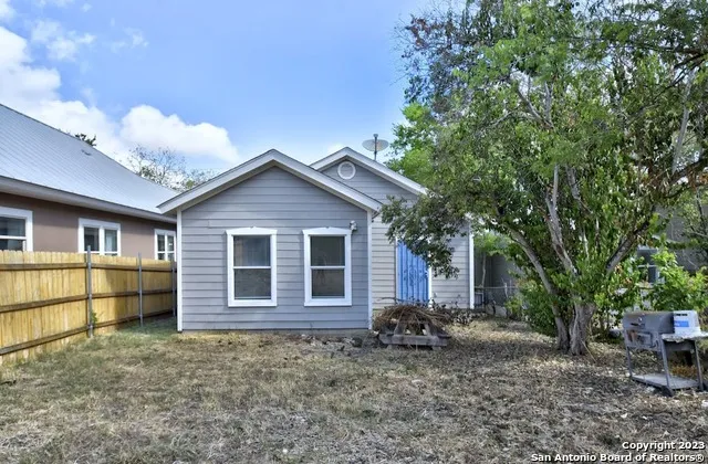 a view of backyard with green space