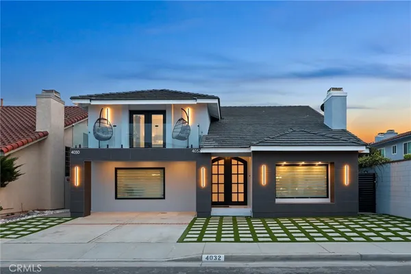 a front view of a house with a garage