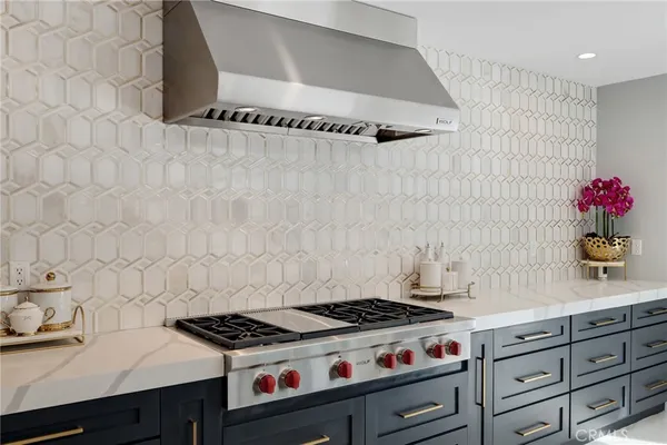 a view of a house with swimming pool and a yard