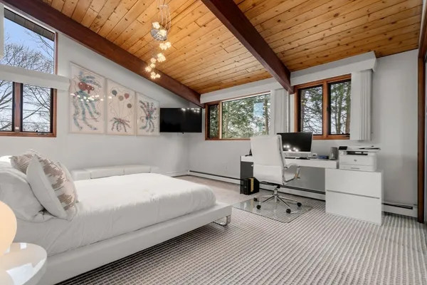 a room with a bed and a table