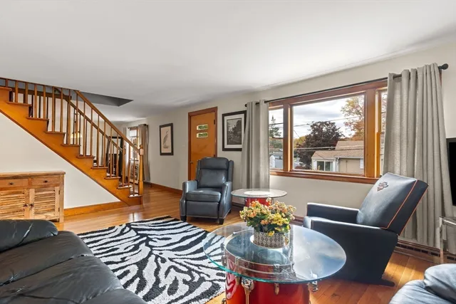 a living room with furniture and a table
