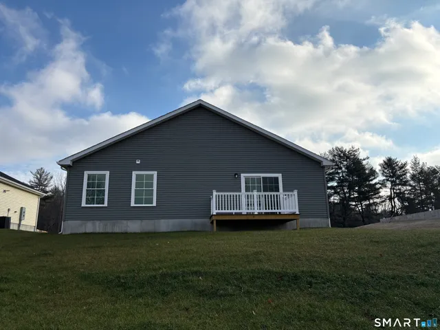 a house view with a garden space