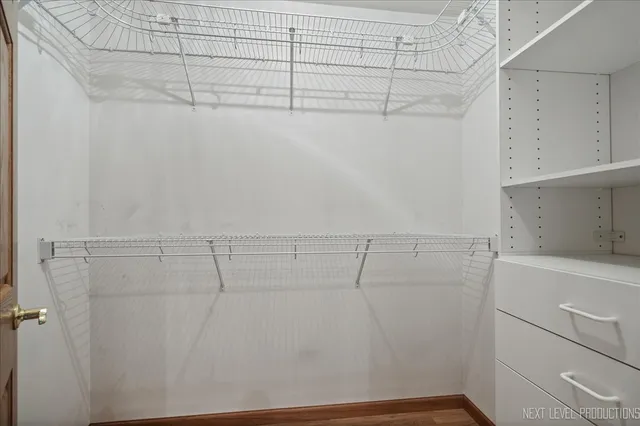 a view of a room with racks on the wall