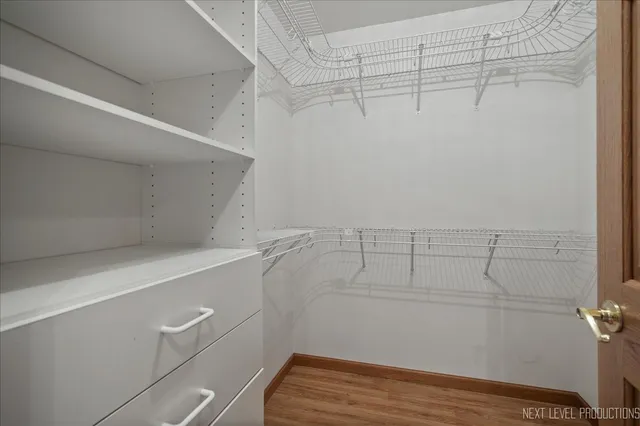 a view of a room with racks on the wall