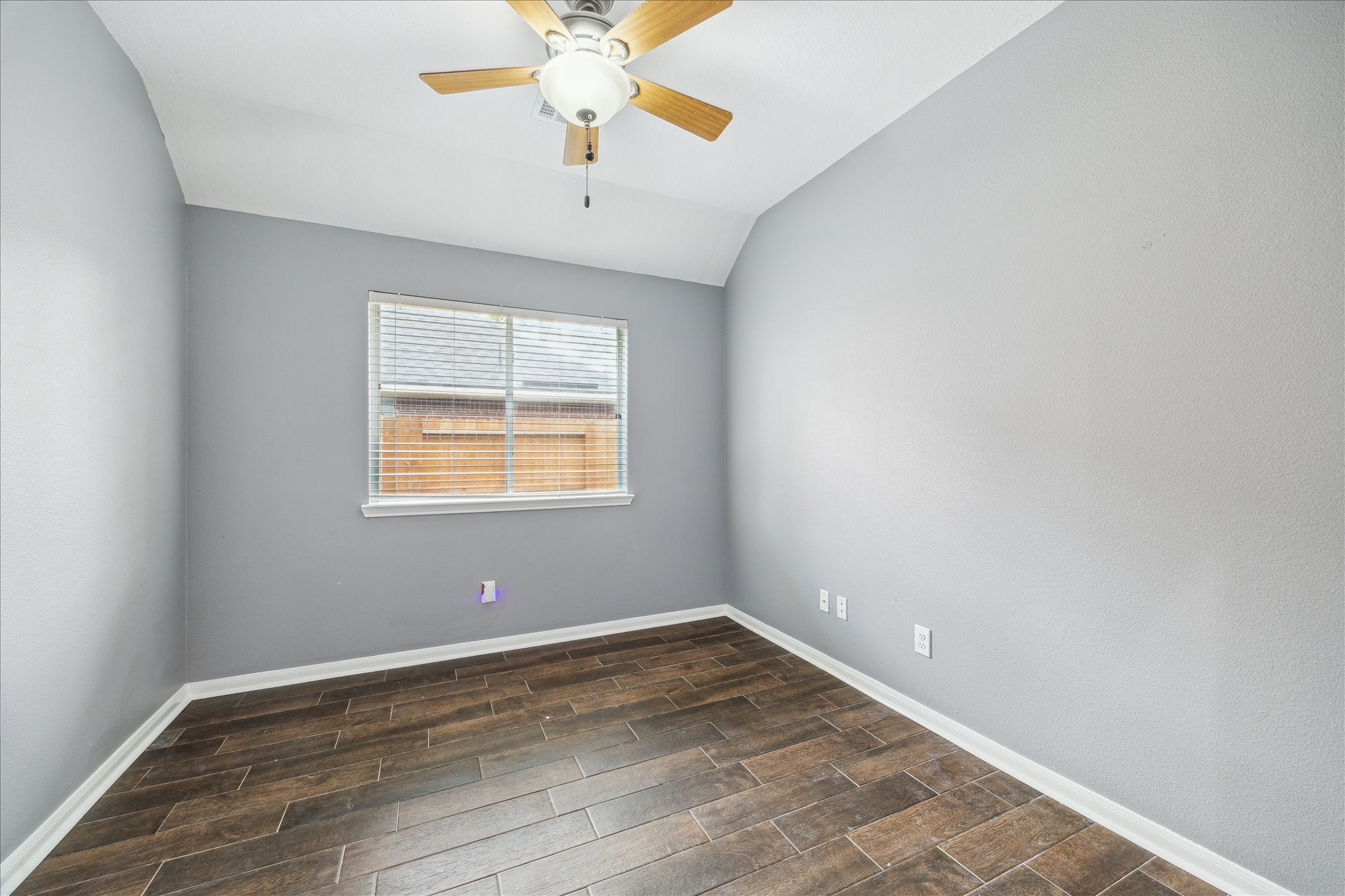 20910 Sandy Briar Court Spring, TX 77379 - Photo 17 of 28 wooden floor in an empty room with a window