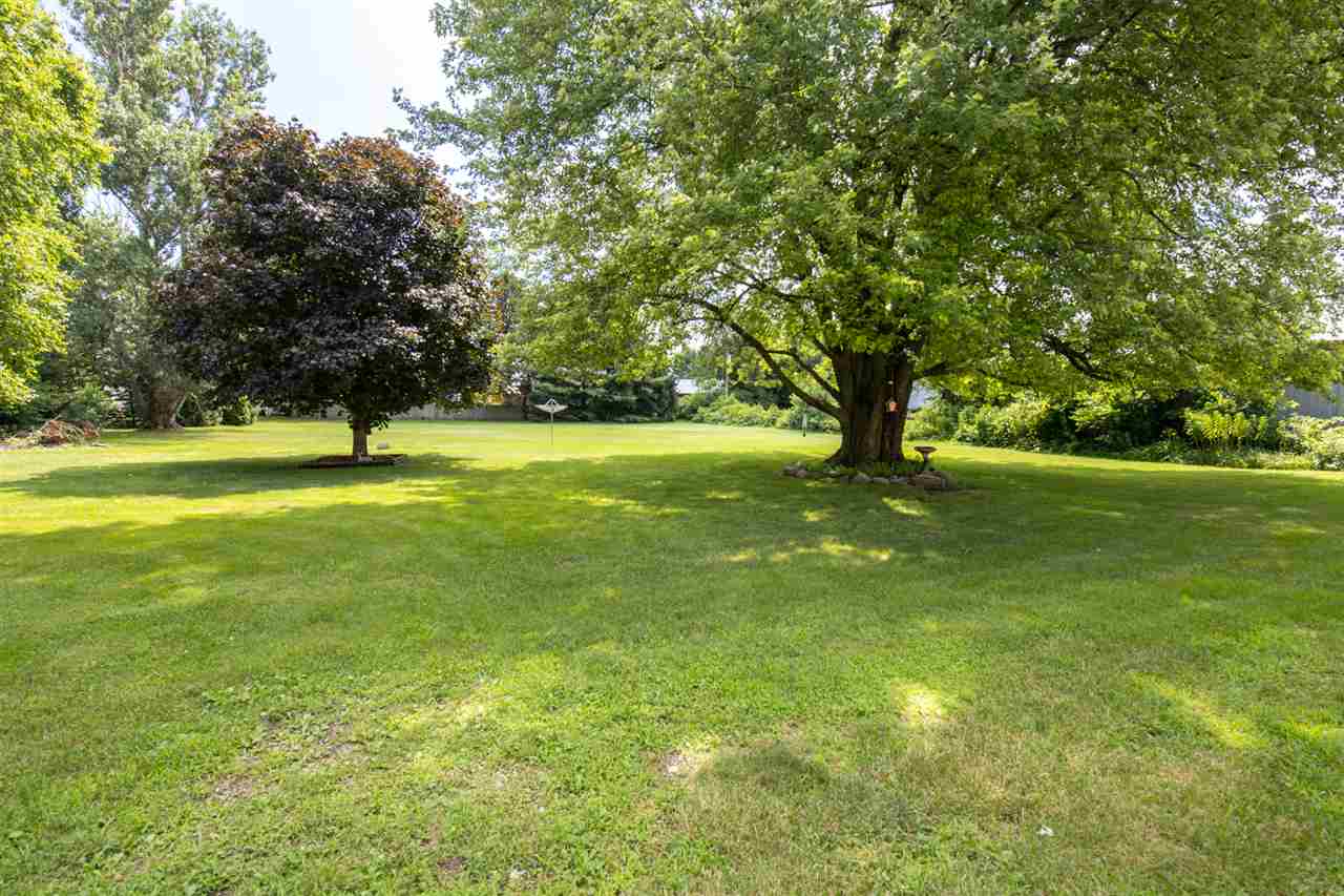 6975 Garden Prairie Road Garden Prairie, IL 61038 - Photo 24 of 28 a view of yard with an trees