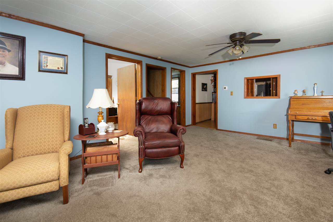 6975 Garden Prairie Road Garden Prairie, IL 61038 - Photo 6 of 28 a living room with furniture