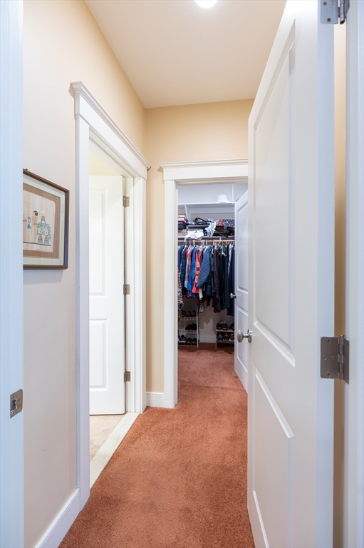 12 Wallis Drive, Unit 12 Wenham, MA 01984 - Photo 15 of 35 a view of a hallway to a livingroom and a hallway