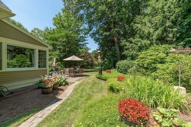 a garden view with a seating space