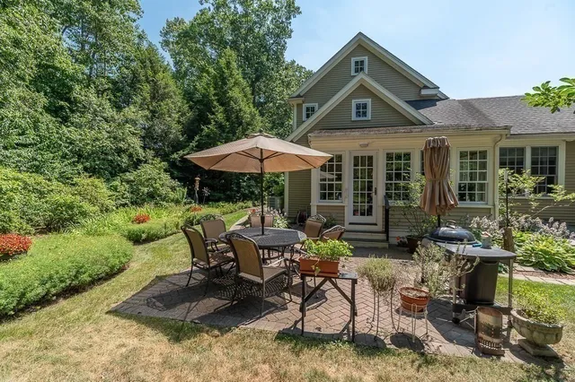a garden view with a seating space