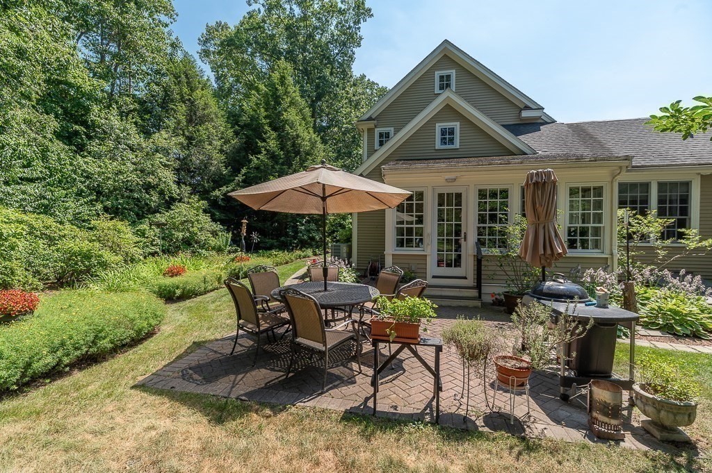 12 Wallis Drive, Unit 12 Wenham, MA 01984 - Photo 28 of 35 a garden view with a seating space