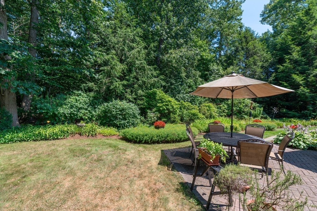 12 Wallis Drive, Unit 12 Wenham, MA 01984 - Photo 29 of 35 a garden view with a seating space