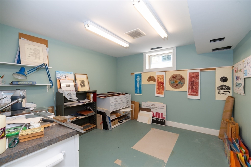 12 Wallis Drive, Unit 12 Wenham, MA 01984 - Photo 32 of 35 a bedroom with furniture and a window