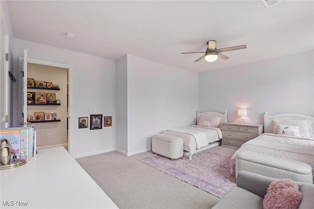 228 Stone Ridge Way Berea, OH 44017 - Photo 17 of 44 Bedroom featuring light carpet and a ceiling fan