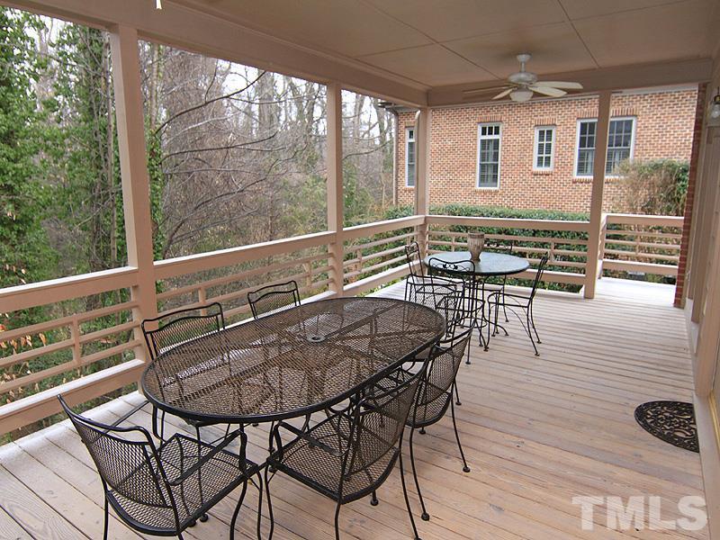 2009 Banbury Road Raleigh, NC 27608 - Photo 8 of 24 a balcony with table and chairs