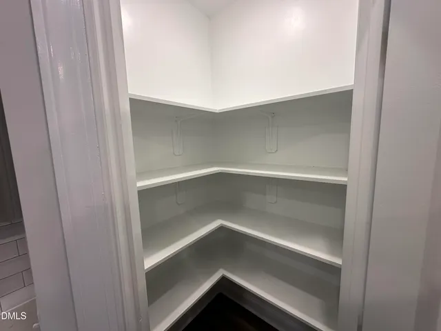 a bathroom with a sink a vanity and a mirror